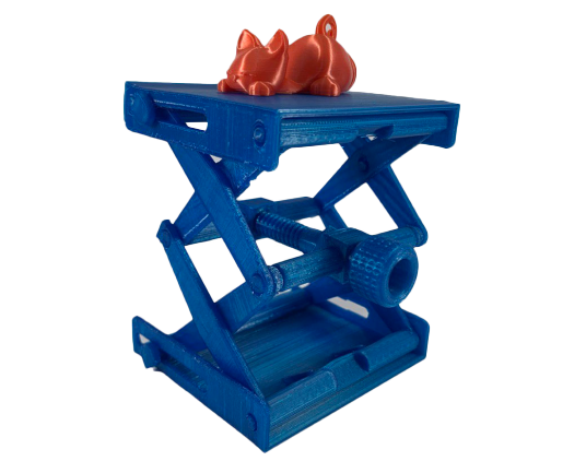 Modèle de chat en 3D sur un support bleu.